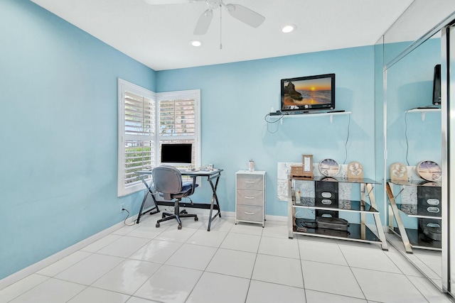 tiled office featuring ceiling fan