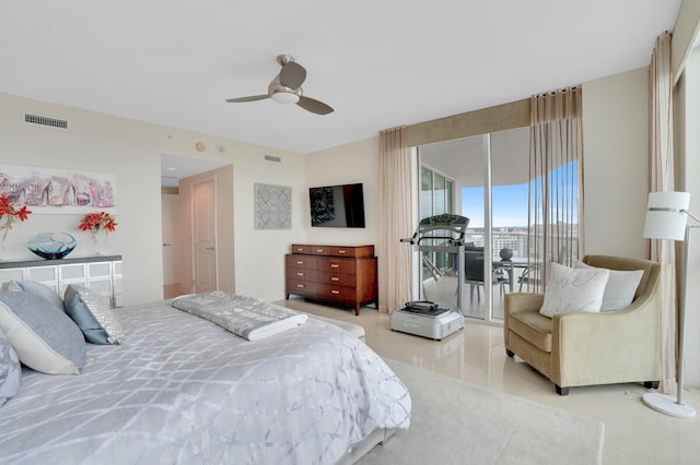 bedroom with ceiling fan and access to outside