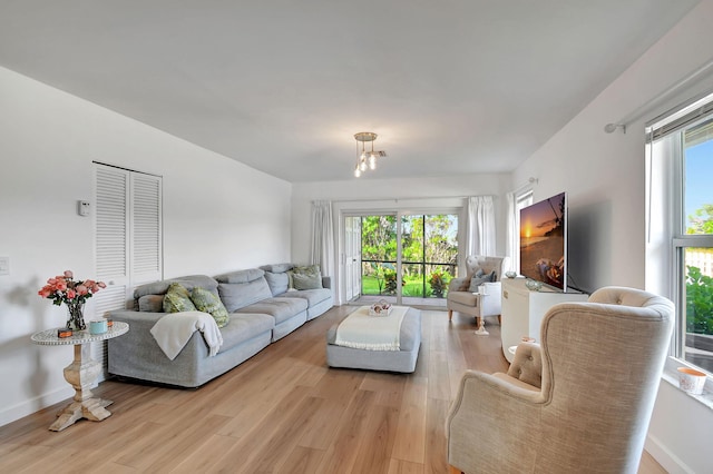 living room with light hardwood / wood-style flooring