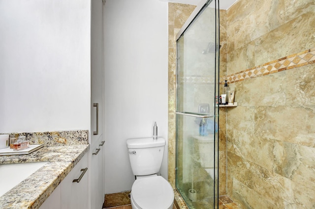 bedroom with ensuite bathroom and light wood-type flooring