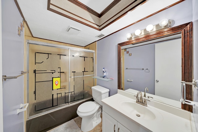 full bathroom with vanity, toilet, crown molding, and bath / shower combo with glass door