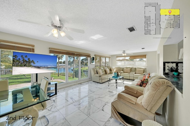 living room featuring a textured ceiling