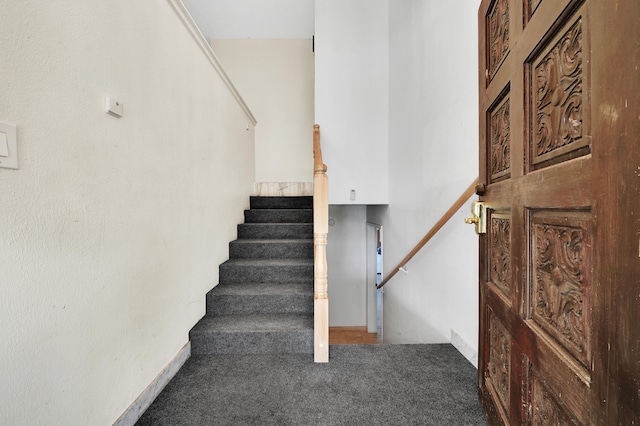 staircase with carpet