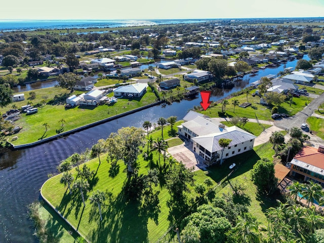 bird's eye view with a water view