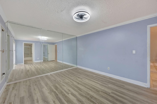 15230 SW 58th St, Miami, FL 33193 - interior space with light wood-type flooring, a textured ceiling, and ornamental molding