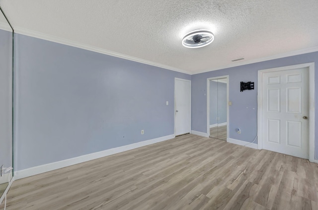 15230 SW 58th St, Miami, FL 33193 - unfurnished bedroom featuring light hardwood / wood-style floors, a textured ceiling, and ornamental molding