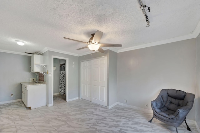 15230 SW 58th St, Miami, FL 33193 - interior space featuring a closet, track lighting, ceiling fan, and ornamental molding