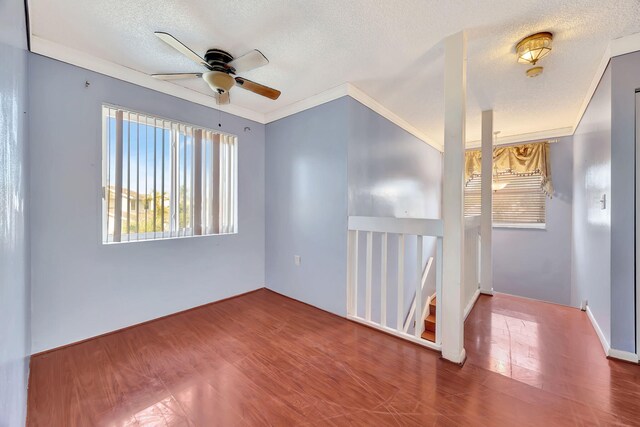 15230 SW 58th St, Miami, FL 33193 - interior space featuring a textured ceiling, hardwood / wood-style flooring, ceiling fan, and ornamental molding