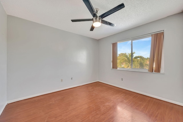 15230 SW 58th St, Miami, FL 33193 - empty room with wood-type flooring, a textured ceiling, and ceiling fan