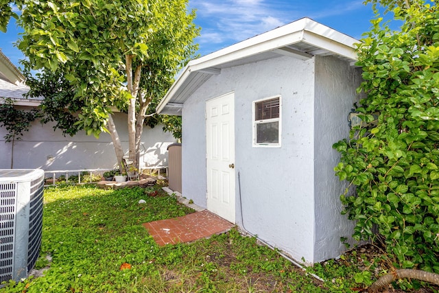 15230 SW 58th St, Miami, FL 33193 - view of outbuilding featuring a yard and central air condition unit
