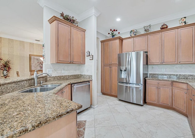 kitchen featuring appliances with stainless steel finishes, backsplash, light stone counters, crown molding, and sink