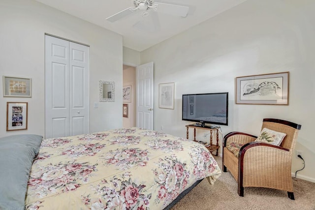 bedroom featuring carpet floors, a closet, and ceiling fan