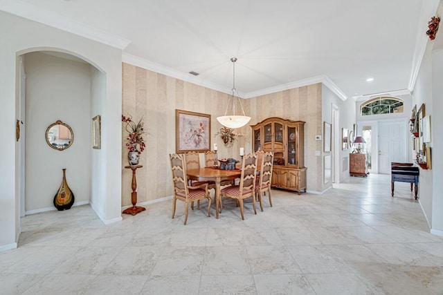 dining room featuring ornamental molding