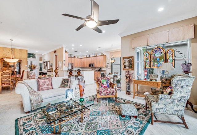 tiled living room featuring ceiling fan and crown molding