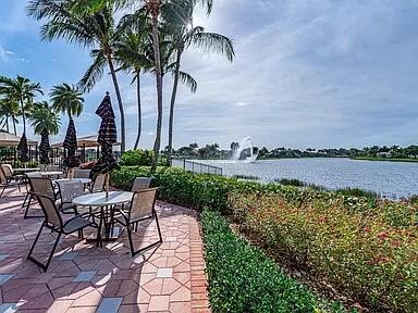 view of patio featuring a water view