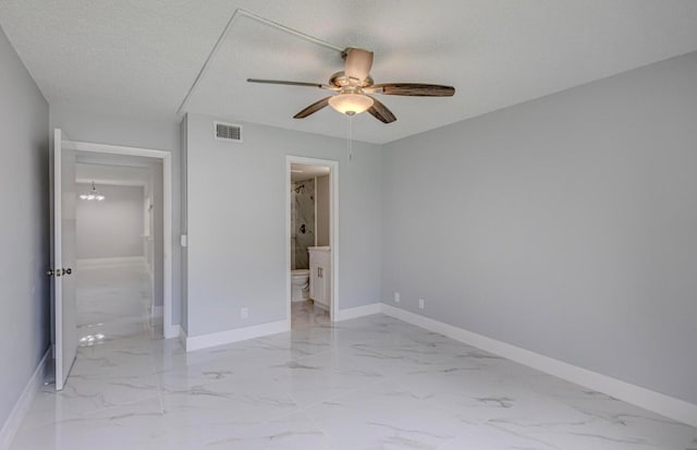 unfurnished bedroom featuring a textured ceiling and ceiling fan