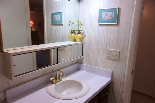 1225 NW 21st St Unit 3506, Stuart, FL 34994 - bathroom featuring wallpapered walls and vanity