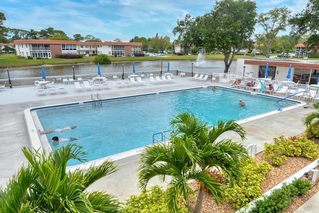 1225 NW 21st St Unit 3506, Stuart, FL 34994 - community pool featuring a patio and a water view