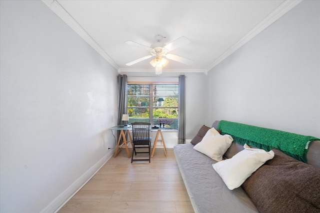 bedroom with ceiling fan, crown molding, and light hardwood / wood-style flooring