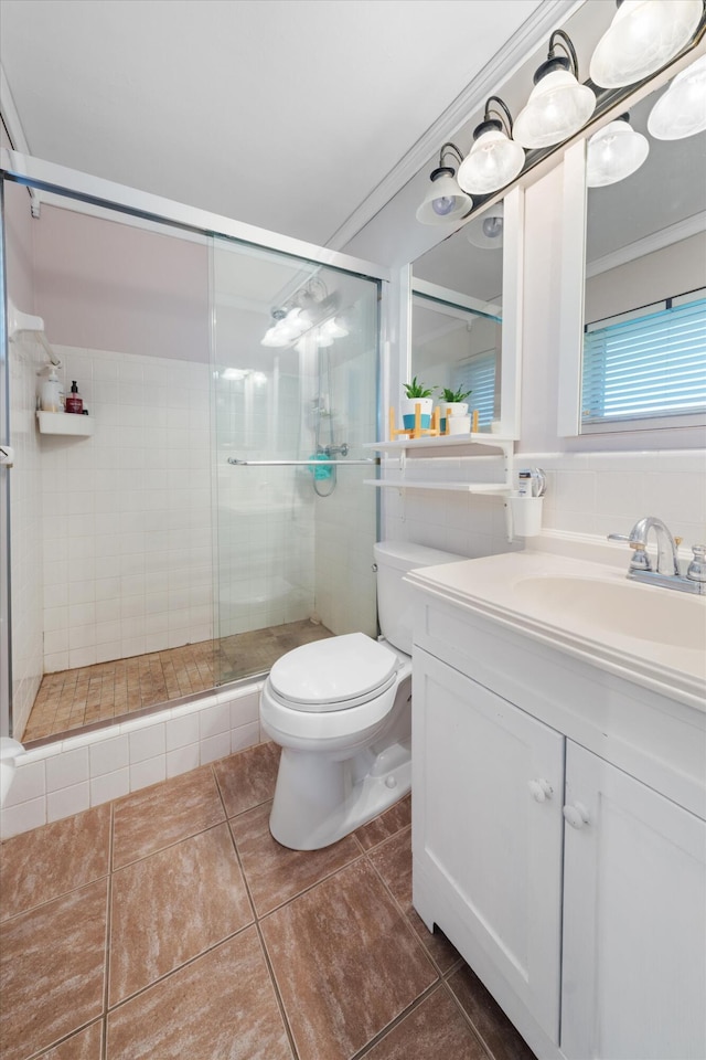 bathroom featuring crown molding, tile patterned flooring, an enclosed shower, and toilet