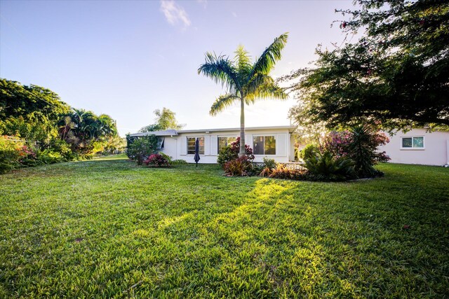 exterior space with a front lawn