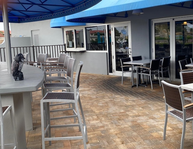 289 Saxony Unit G, Delray Beach, FL 33446 - view of patio / terrace featuring outdoor dining space