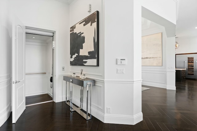 hallway featuring crown molding