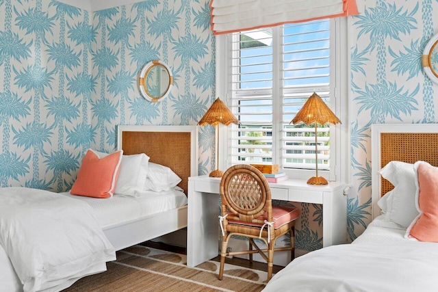 bedroom featuring hardwood / wood-style floors and multiple windows