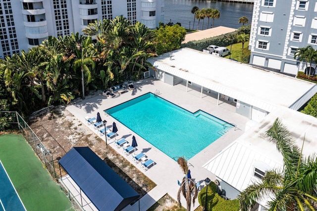 view of swimming pool with a patio