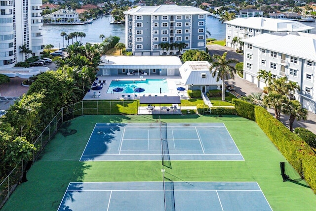 birds eye view of property featuring a water view