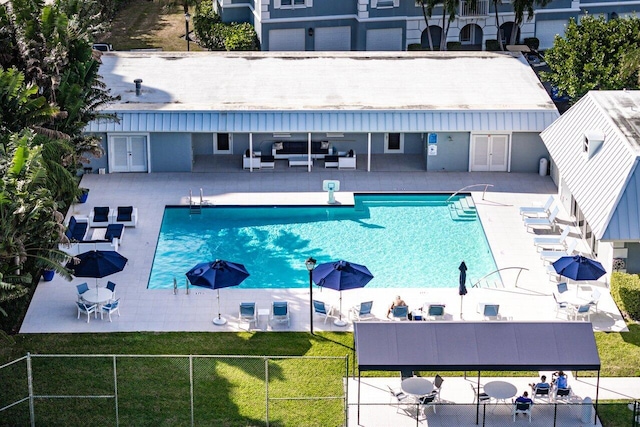 view of swimming pool with a patio area