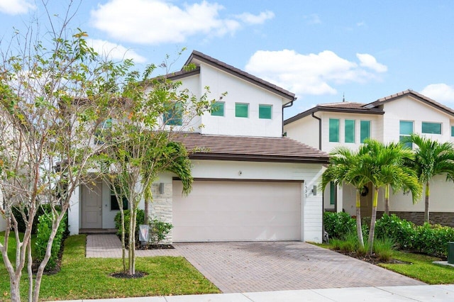 view of front of property featuring a garage