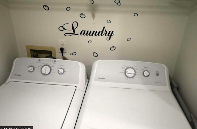 laundry area with washer and dryer