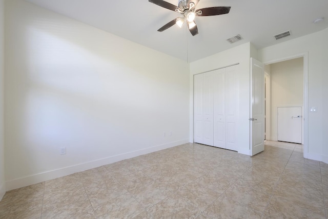 unfurnished bedroom with a closet and ceiling fan