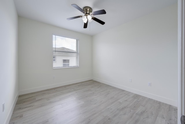 unfurnished room with ceiling fan and light hardwood / wood-style flooring