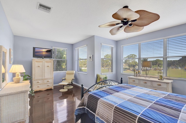 bedroom featuring hardwood / wood-style flooring and ceiling fan