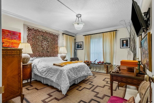 bedroom with crown molding and a textured ceiling