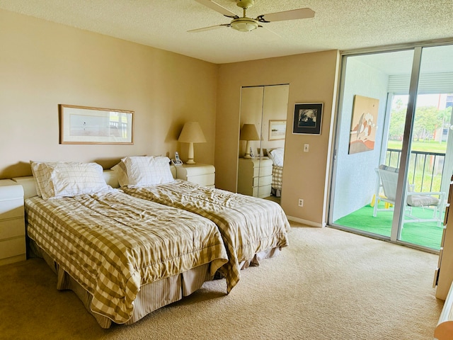 bedroom with carpet flooring, a textured ceiling, access to outside, and ceiling fan