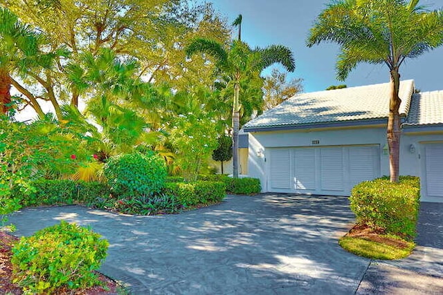 exterior space with a garage