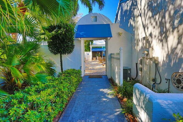 doorway to property with central AC