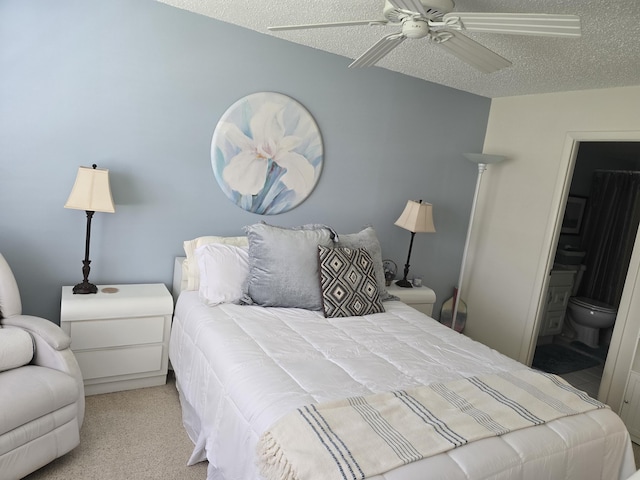 112 Lake Dora Dr, West Palm Beach, FL 33411 - bedroom with a textured ceiling, carpet, ensuite bathroom, and a ceiling fan