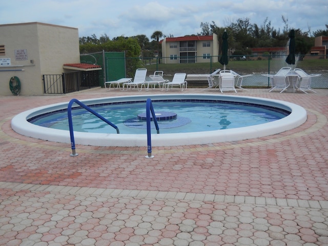 view of pool featuring a patio