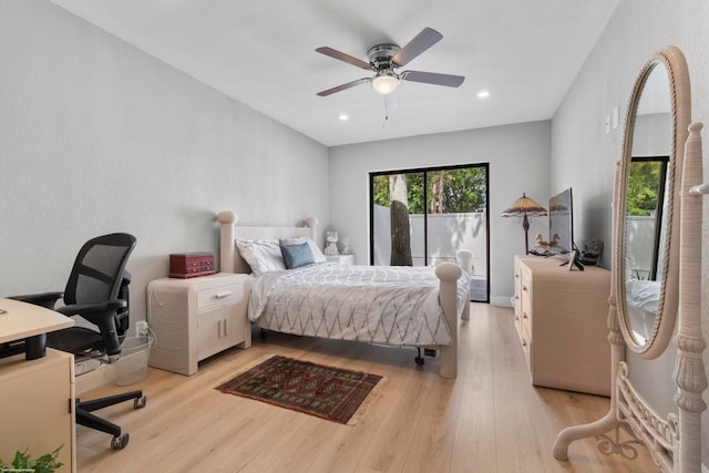 bedroom with ceiling fan and light hardwood / wood-style flooring