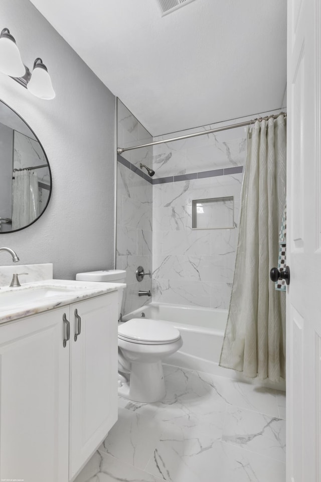 full bathroom with toilet, vanity, and shower / bath combo with shower curtain