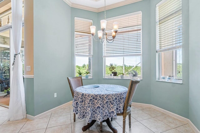 dining room featuring light tile patterned floors, an inviting chandelier, and crown molding