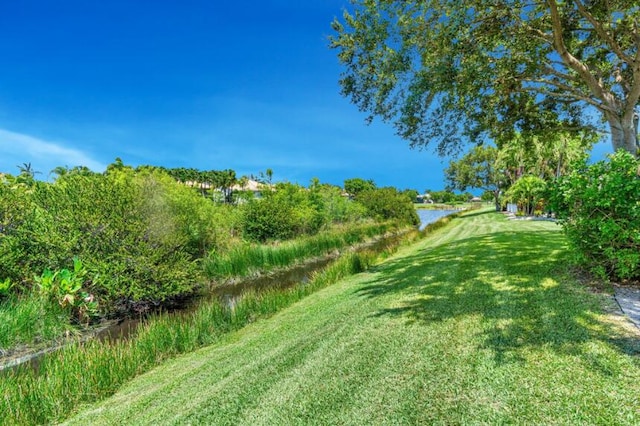 view of yard featuring a water view