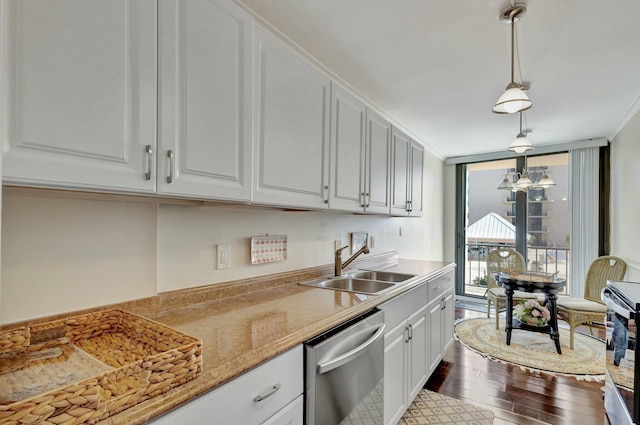 4200 N Ocean Dr Unit 2-202, Singer Island, FL 33404 - kitchen featuring stainless steel appliances, a sink, white cabinets, dark wood finished floors, and floor to ceiling windows