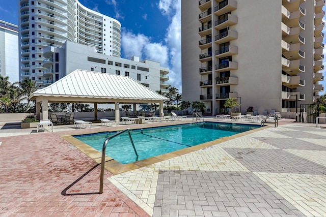 view of pool with a gazebo and a patio area