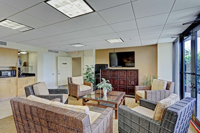 4200 N Ocean Dr Unit 2-202, Singer Island, FL 33404 - living room featuring expansive windows