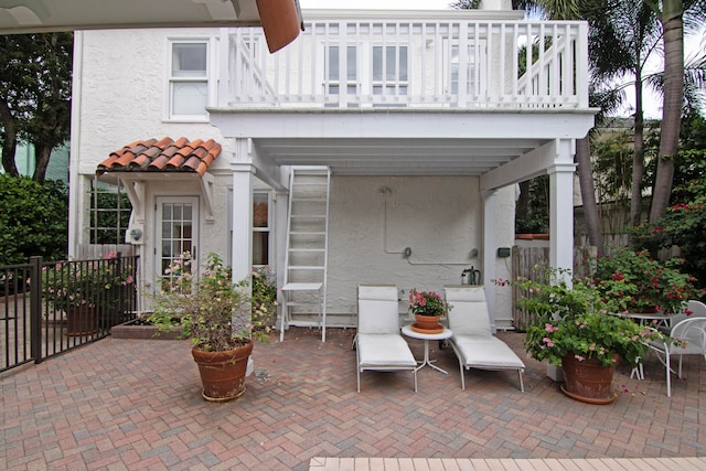 view of patio / terrace with a balcony